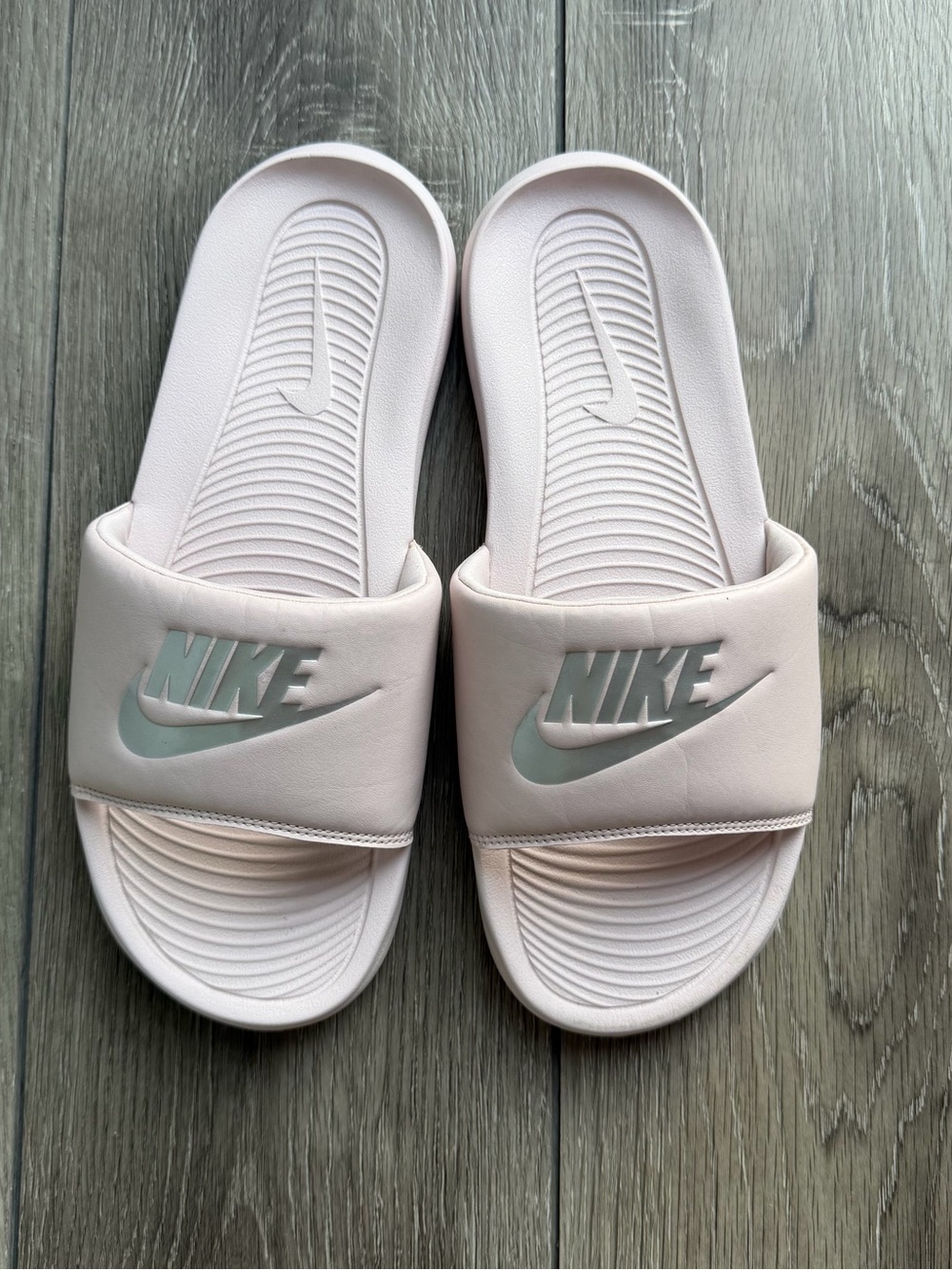Nike Women's Pale Pink Slide Sandals with Mint Logo